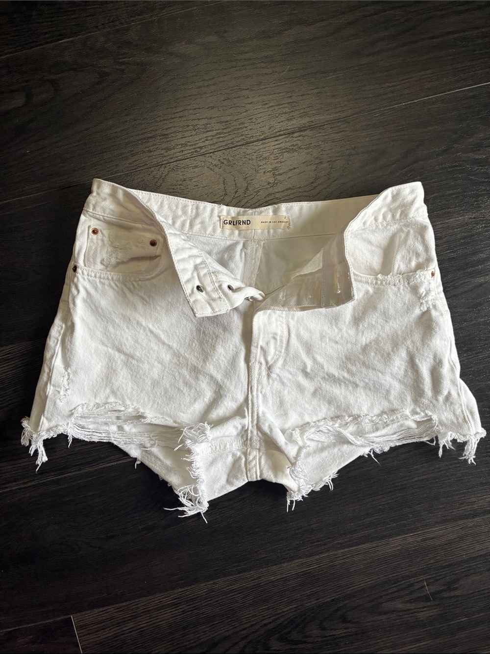 GRLFRND White Frayed High-Rise Cutoff Shorts